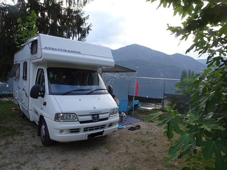 Poppy the westie and Betsy at the lake orta campsite