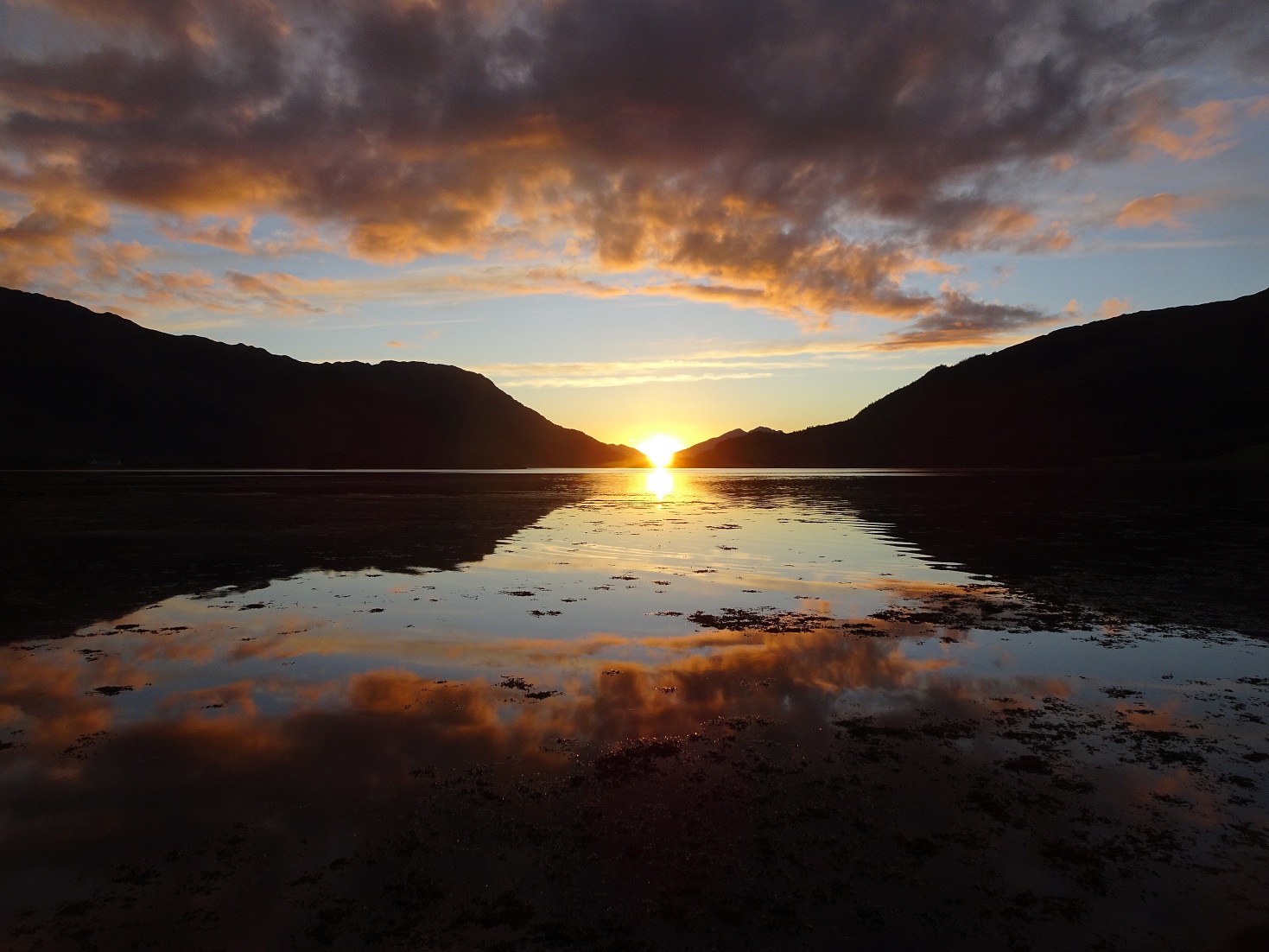 sungoing down over glen coe