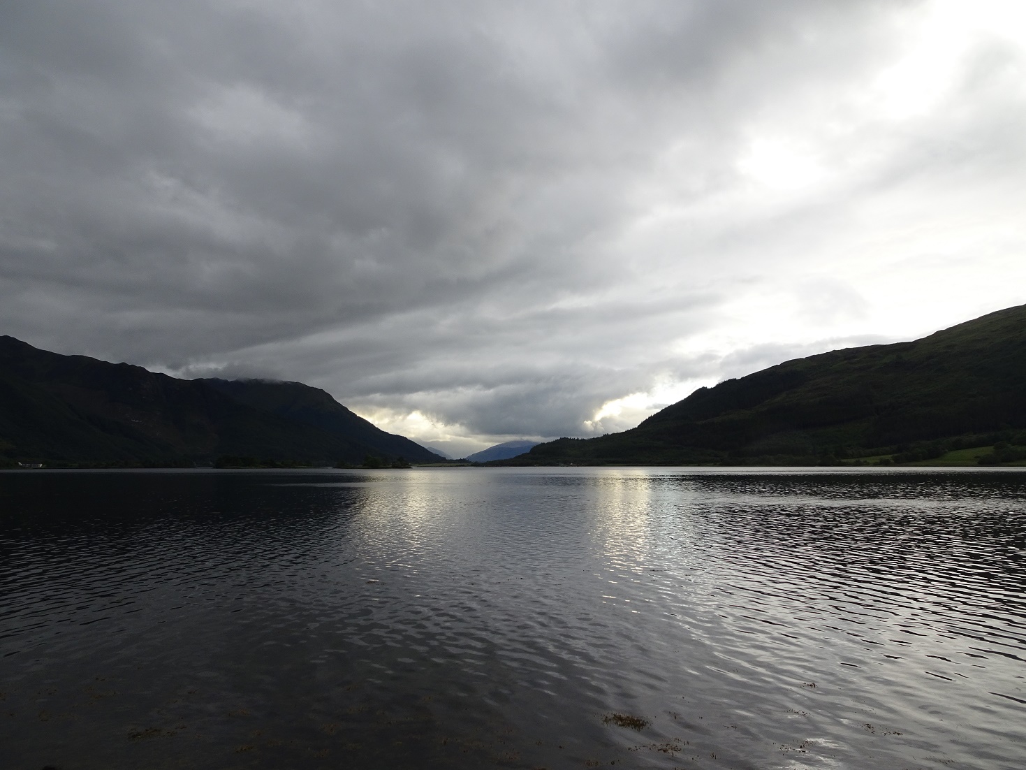 the mist lifts at loch leven