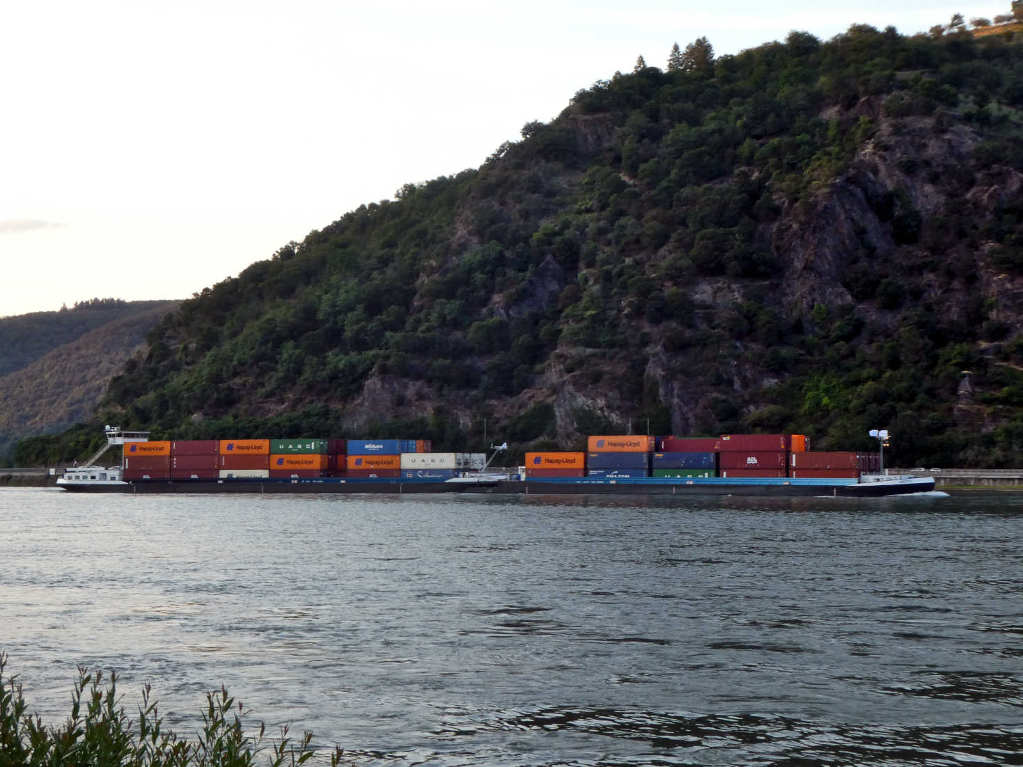 barges on the rhine at dusk