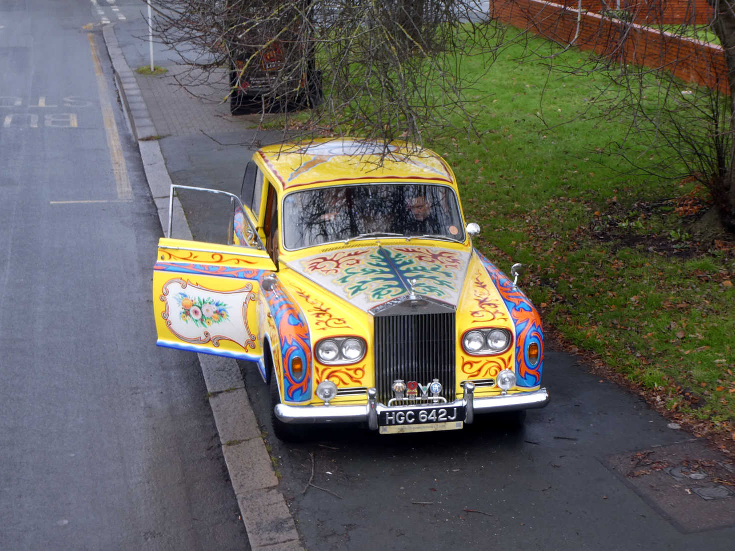 john's car parked outside his house